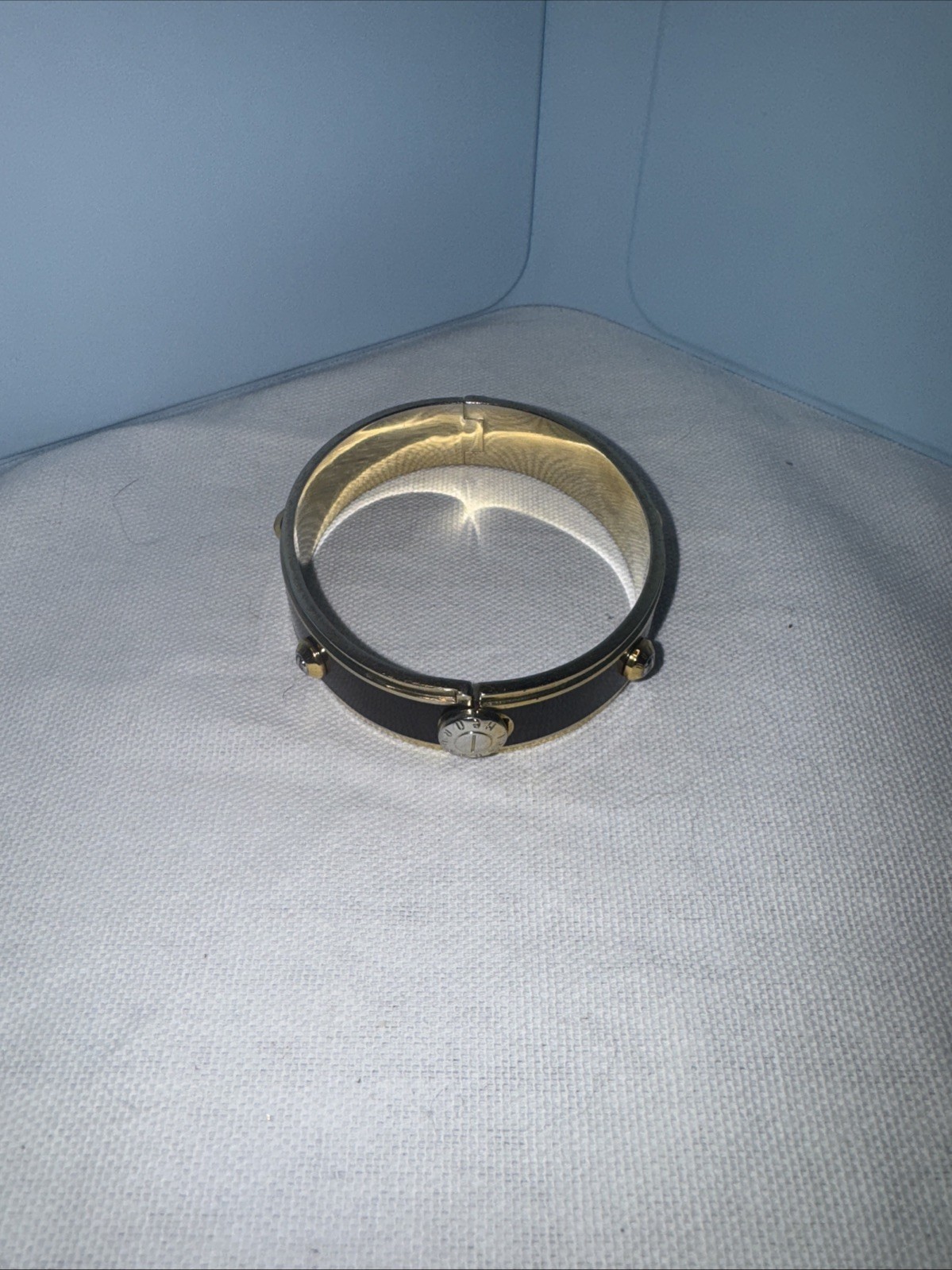 New HENRI BENDEL Goldtone Rivet w Logo Brown Metal Bangle Bracelet