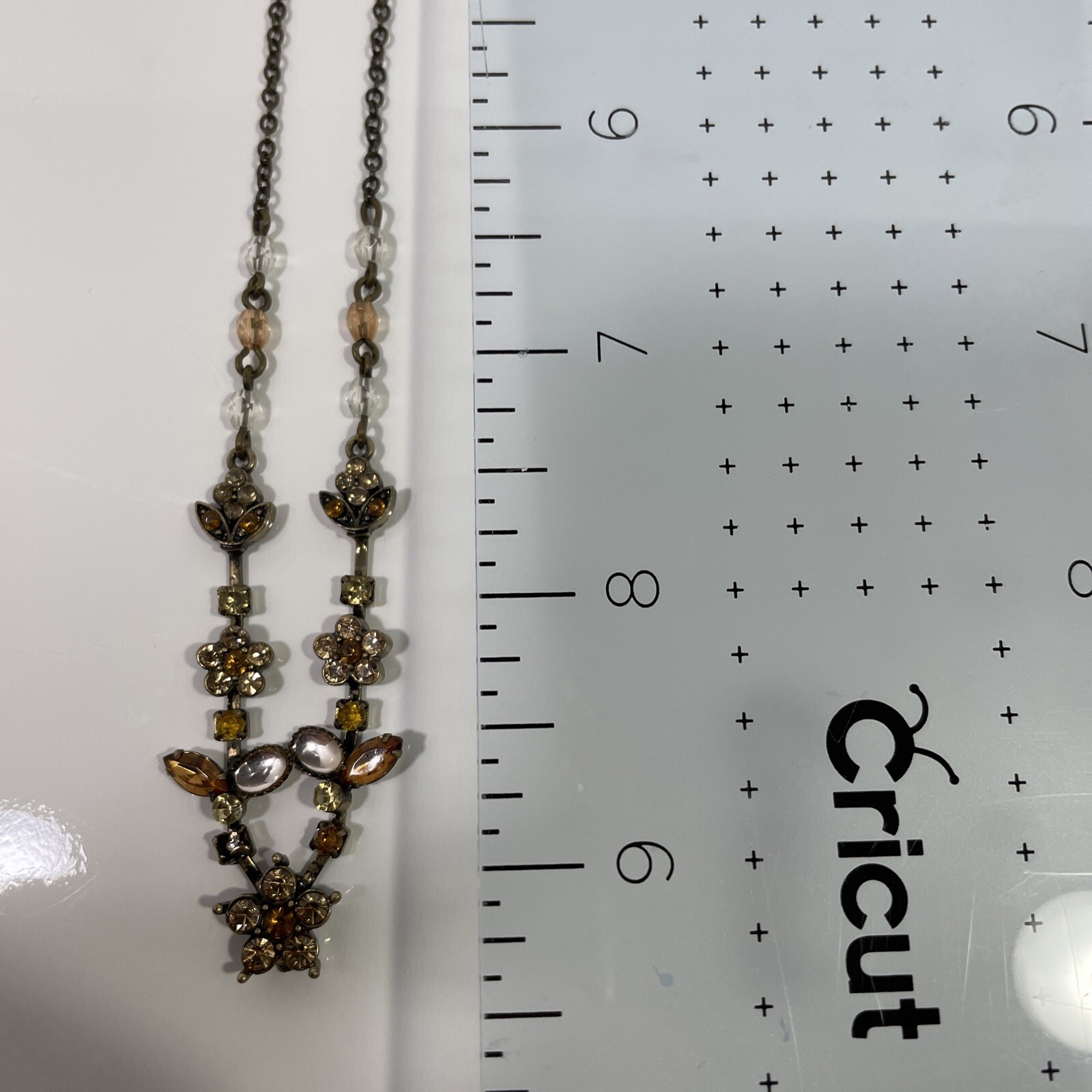 Antiqued Avon brass & topaz rhinestone Flower leaves necklace