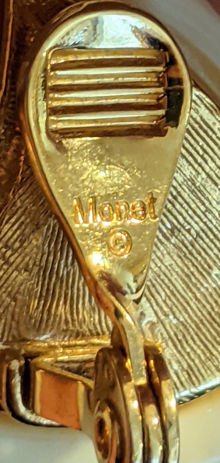 Vintage Monet Gold Tone & Ivory Acrylic/Lucite Scalloped Swirl Clip-on Earrings