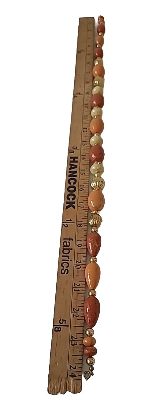 Vtg 24″ Speckled Gold Orange Cream Graduated Beaded Necklace w/Gold Tone Spacers