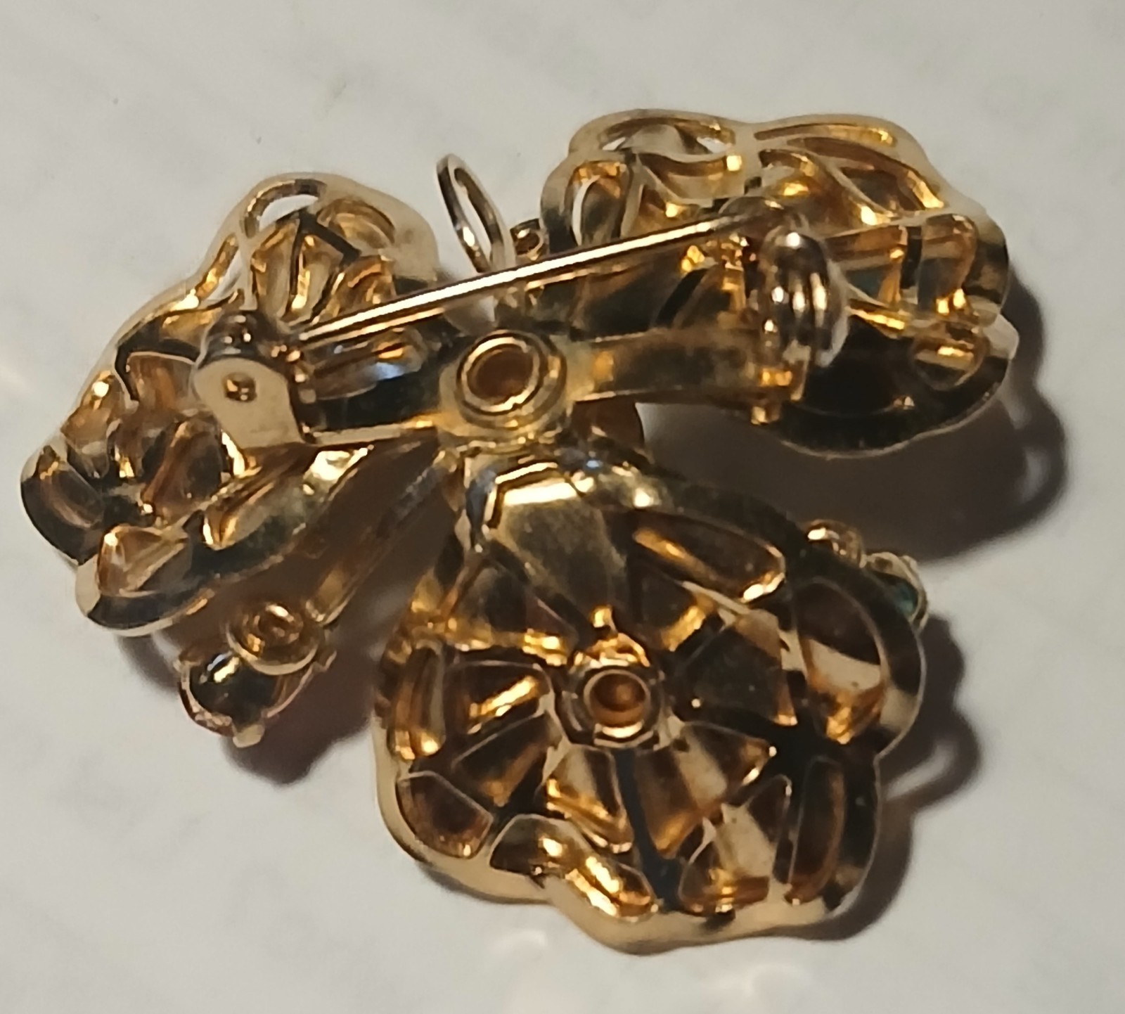 Vintage flower brooch/ pin with multi color rhinestones in gold metal setting