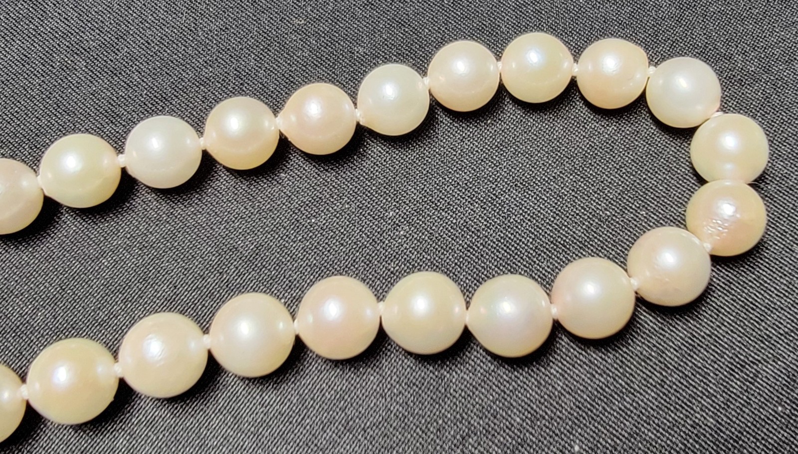 Vintage Pearl Necklace 6.9mm Pearls and 14K Gold Clasp 23.5 in Matinee Length