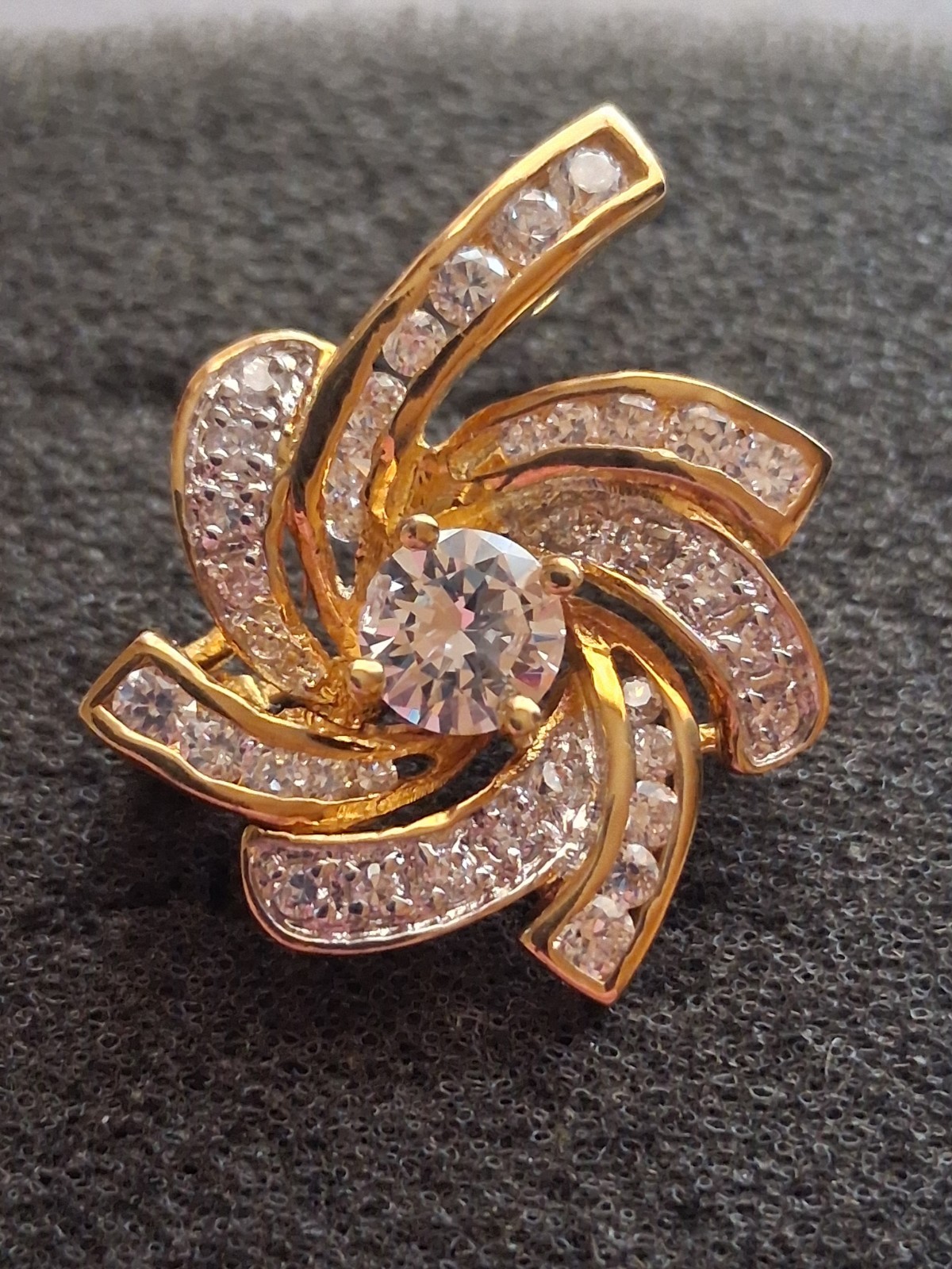 Pinwheel cubic zirconia embellished gold plated convertible brooch/pendant