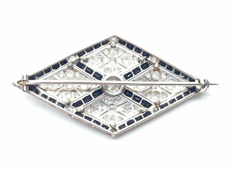 Lozenge Shape With Round Cut Cubic Zirconia & Calibre Cut Onyx Border Brooch