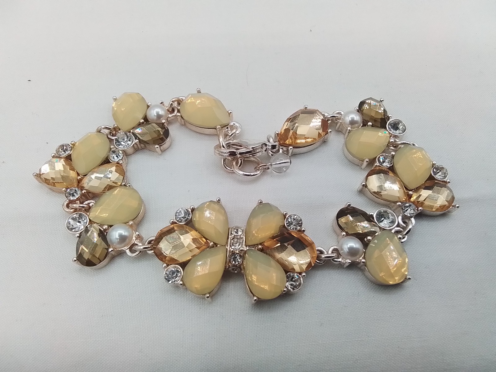 MILKY YELLOW FACETED HONEY-HUED MORPHO BUTTERFLY INSECT MOTIF TENNIS BRACELET