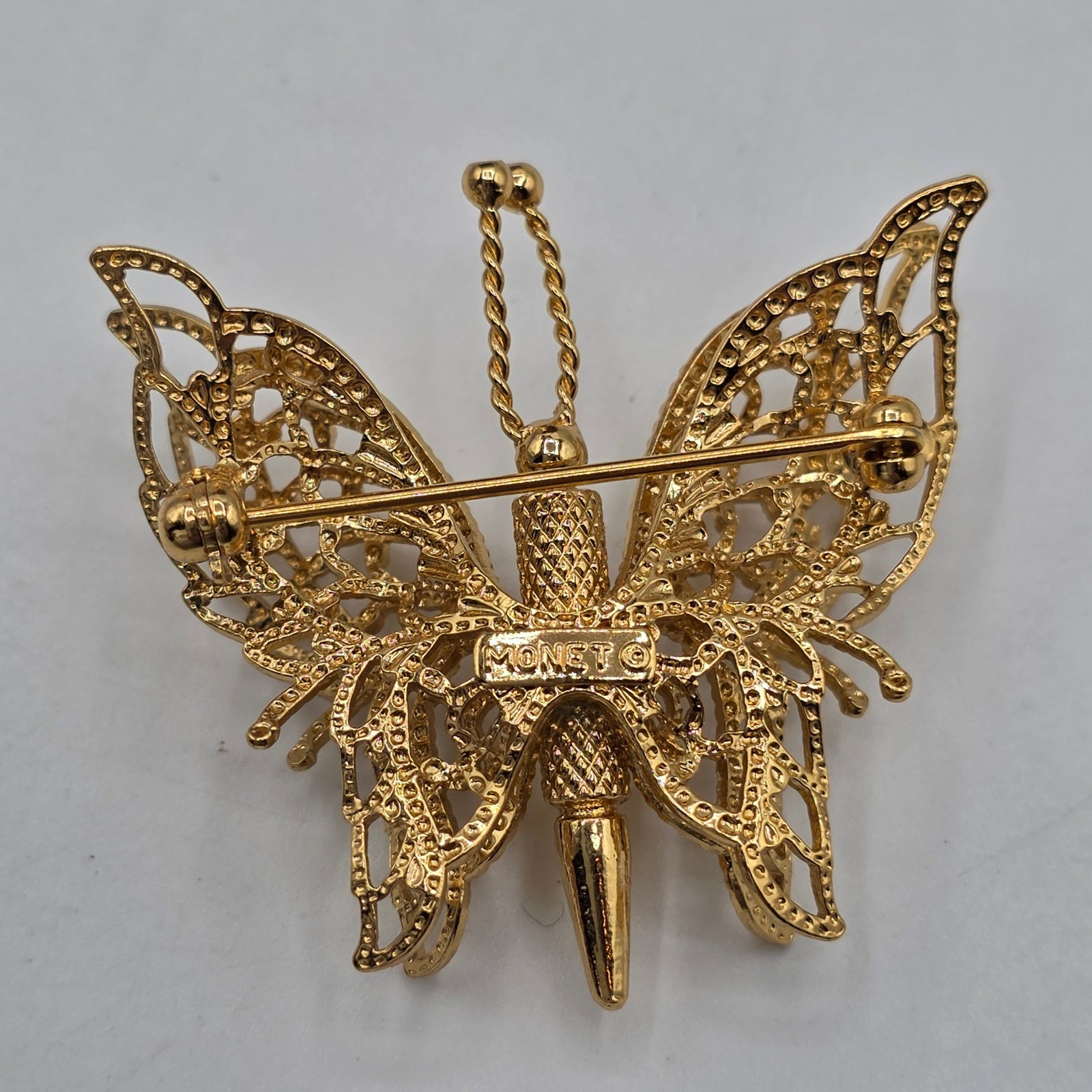 Monet Vintage Butterfly Brooch Gold Tone Filigree Openwork Textured Pin Garden