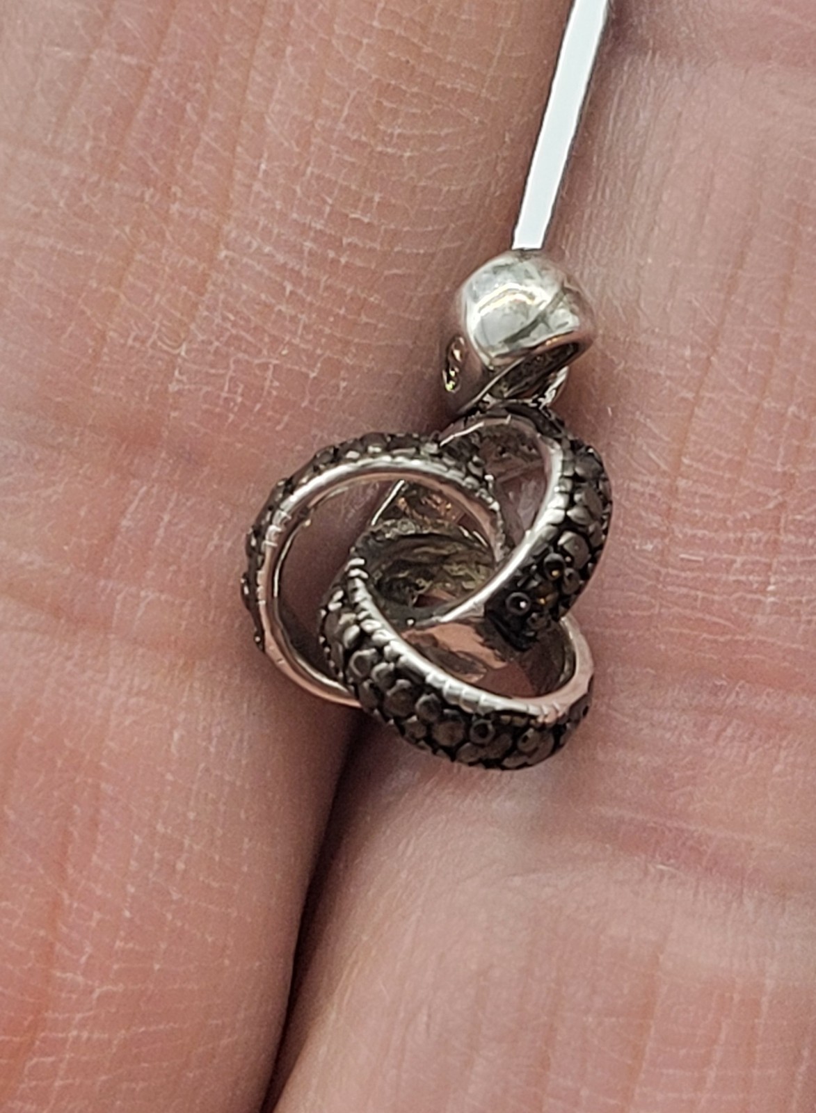 Estate, DBJ sterling pendant, 2 intertwined rings, black crystal stones