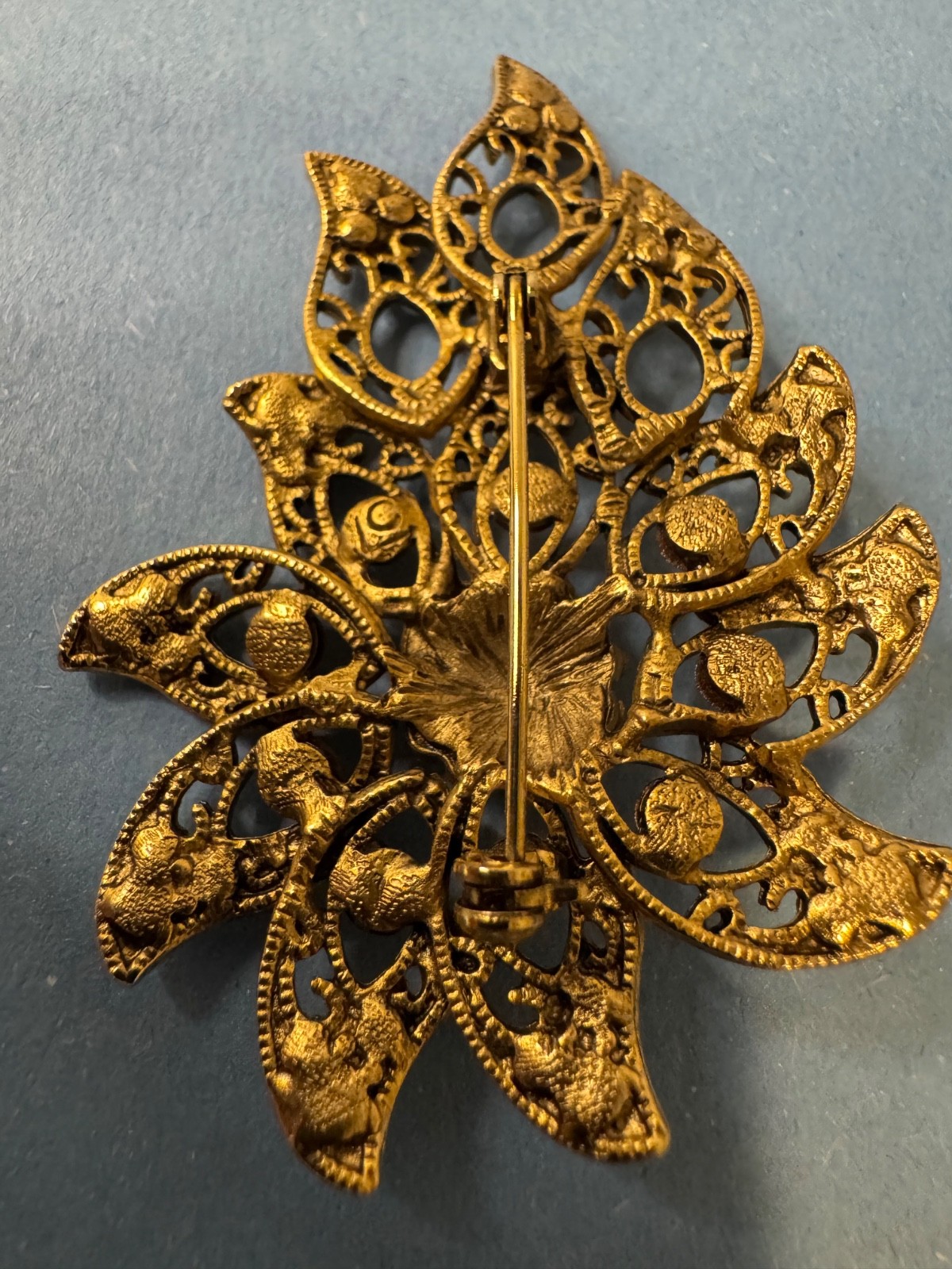Gold Tone Brooch with Amber and Brown Glass Stones In A Floral or Leaf Design