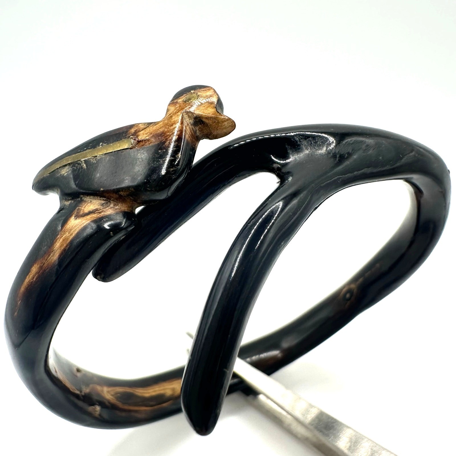 Vintage carved genuine black coral bird figural bypass bangle bracelet