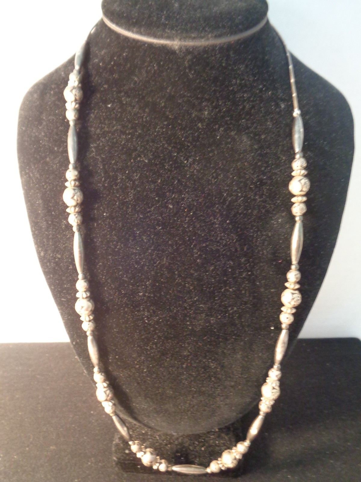 VINTAGE SOUTHWESTERN STYLE SILVER LIKE 28 INCH NECKLACE,BALLS,BARRELS,DISCS.