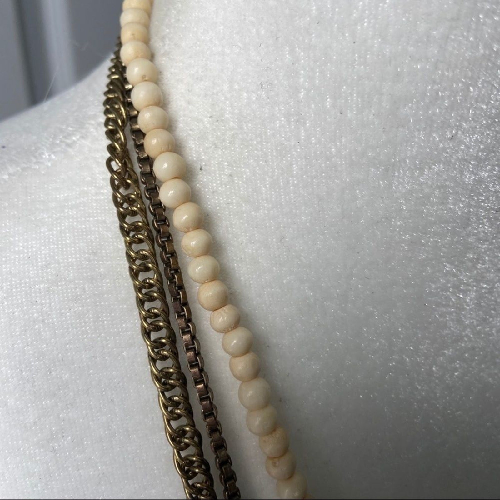 New Berry funky mixed media multi strand ivory tone and gold fringe necklace