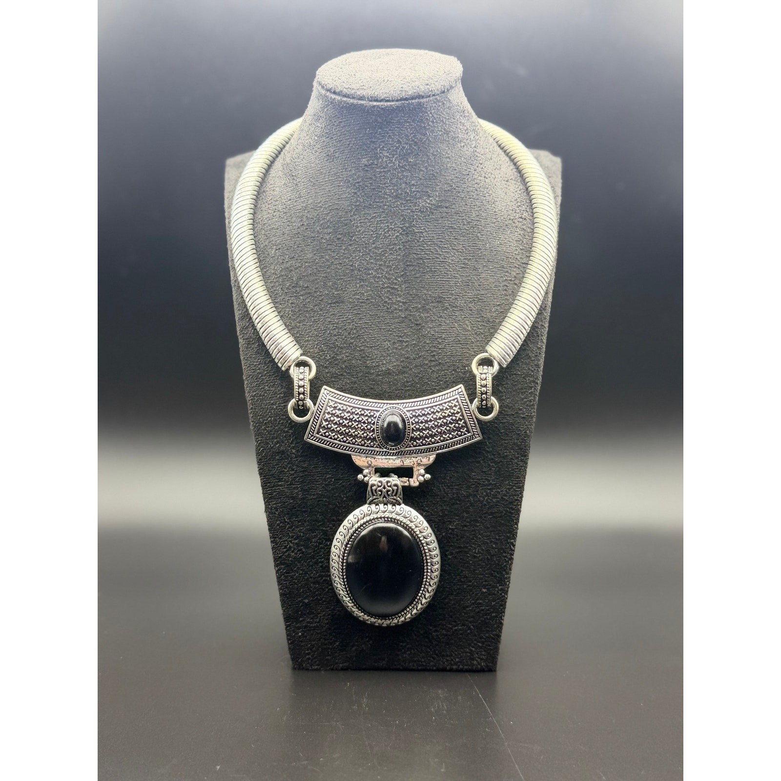 Vintage style silver-tone necklace with black enamel pendant