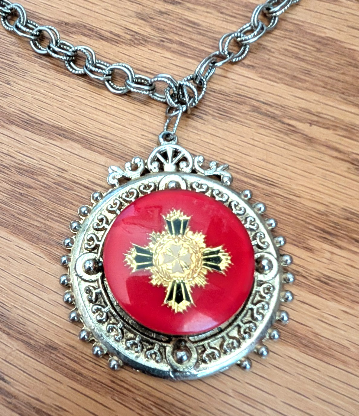 Red pendant with golden 26″ chain and accents – VGG 66 years old