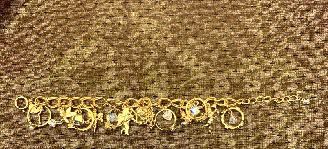 Kirks Folly Gold Tone Charm Bracelet Cupid Hearts Rings Crystals Angel