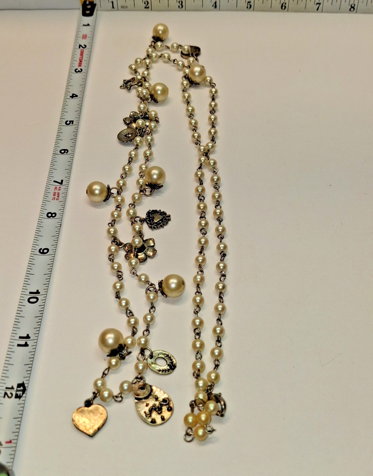 Long 26″ Vintage Silver Charm and Simulated Pearl Necklace Hearts,Flowers,Stars