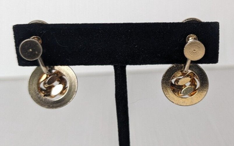 Vintage gold tone earrings knot design screw back