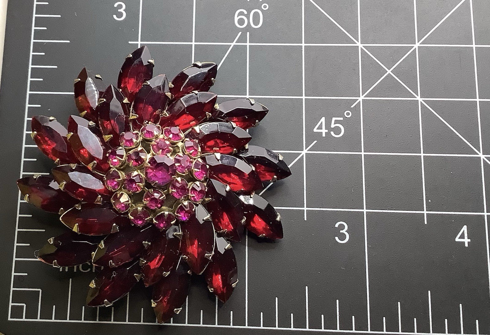 Vintage Gold Tone Riveted Fuchsia & Red Navette Rhinestone Swirl Flower Brooch