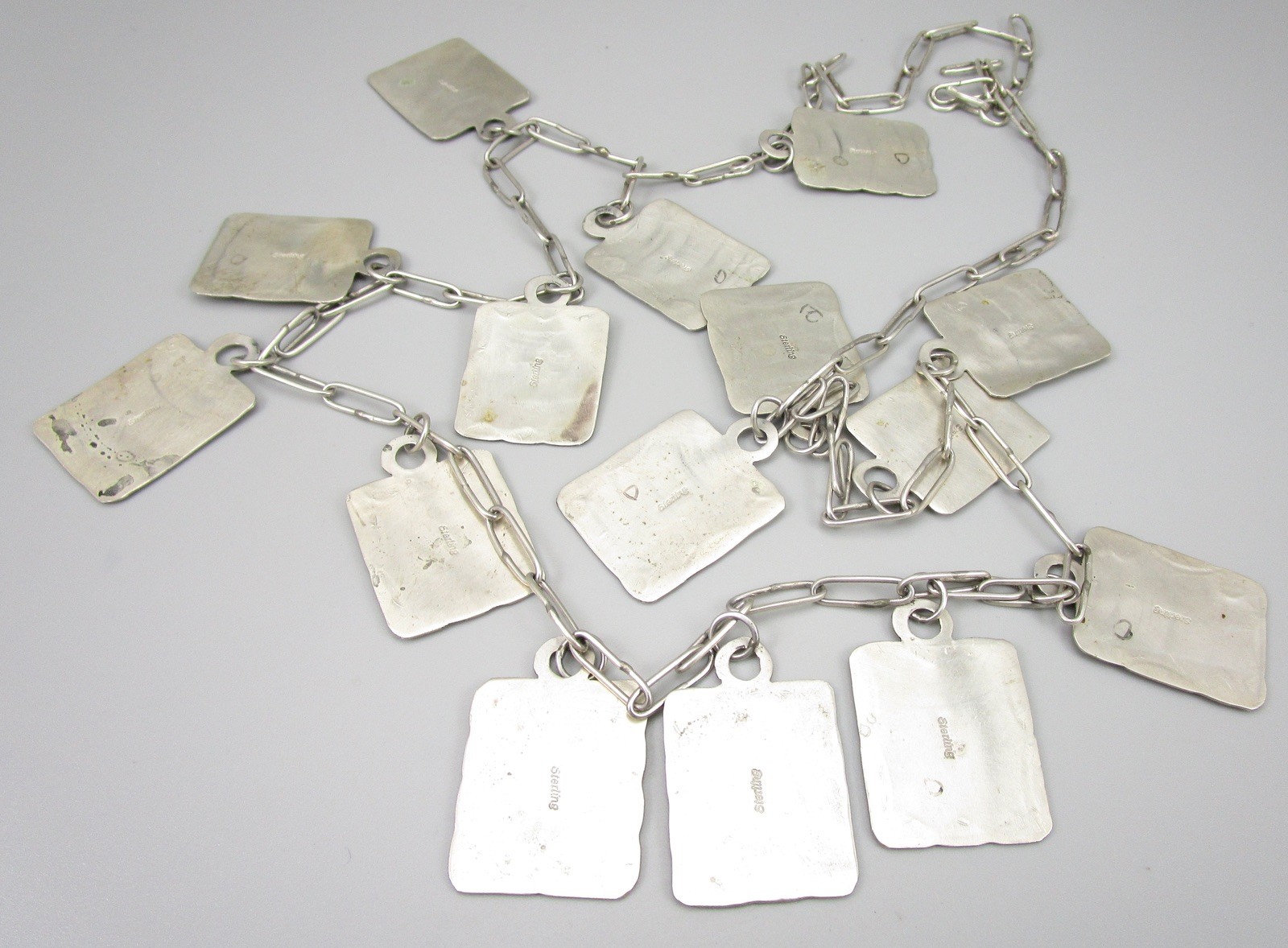 AMAZING 34″ NAVAJO STERLING NECKLACE W/ 15 DOG LUGGAGE TAG DOGTAG CHARMS – 75G