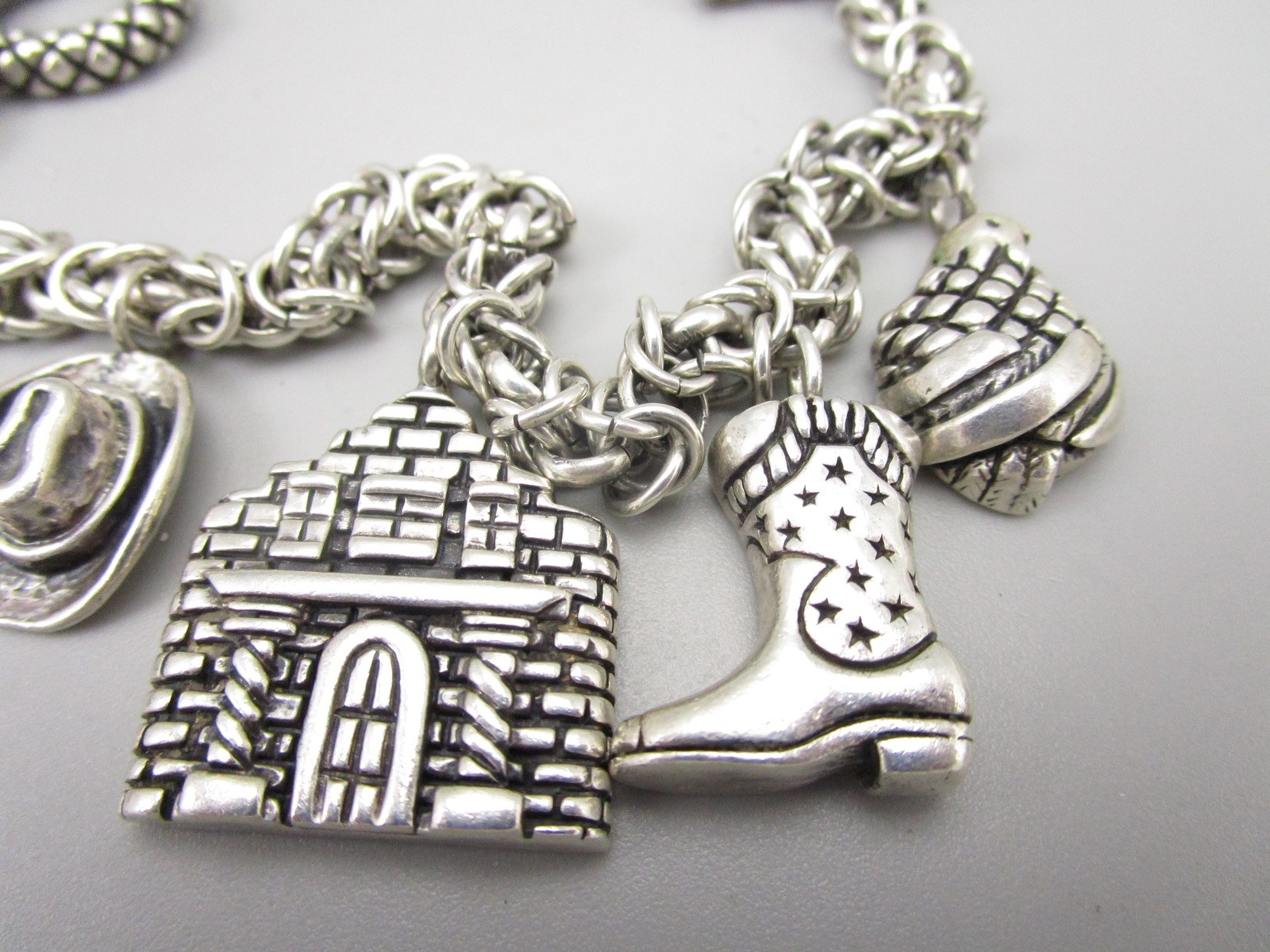 SCARCE DIAN MALOUF STERLING SILVER TEXAS THEME CHARM BRACELET 60 GRAMS