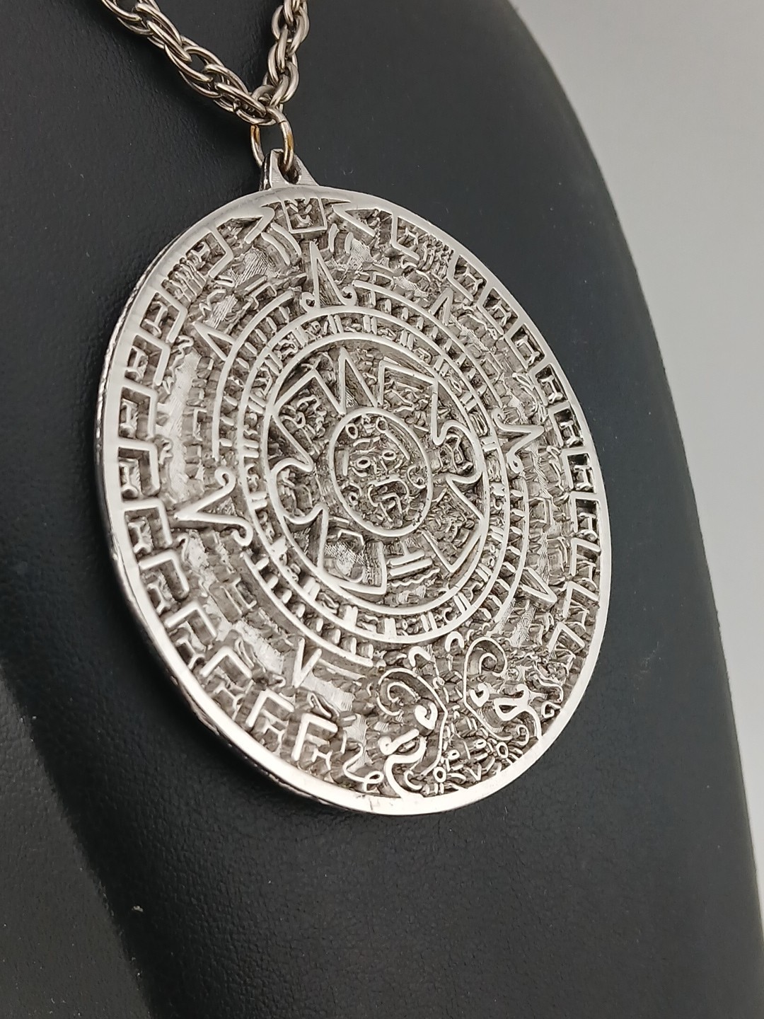 TORTOLINI 1960s silver tone Aztec Calendar textured design medallion necklace