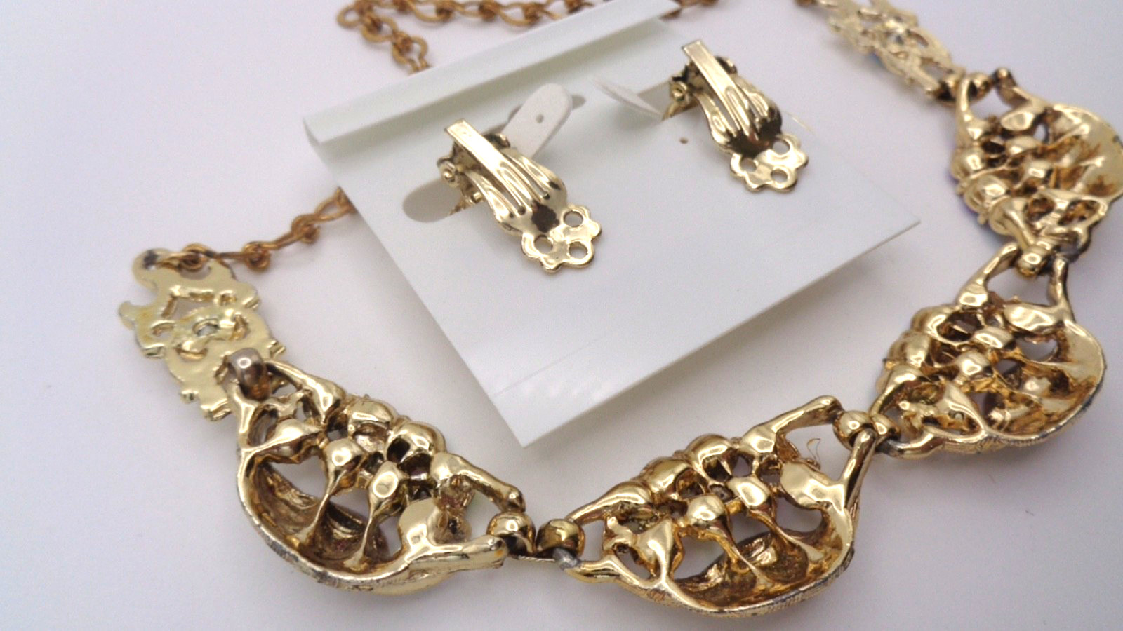Vintage Textured Gold Tone Leaf Red AB Rhinestone Necklace & Clip Earring Set