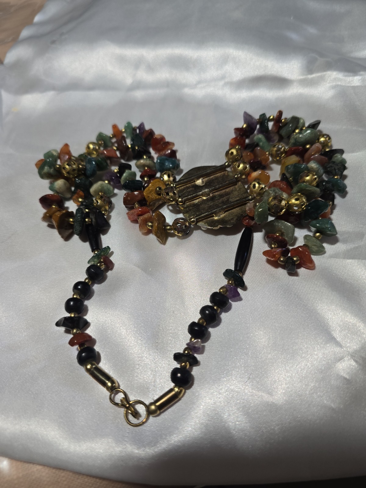 Vintage Multi-strand gemstone necklace with green aventurine centerpiece.