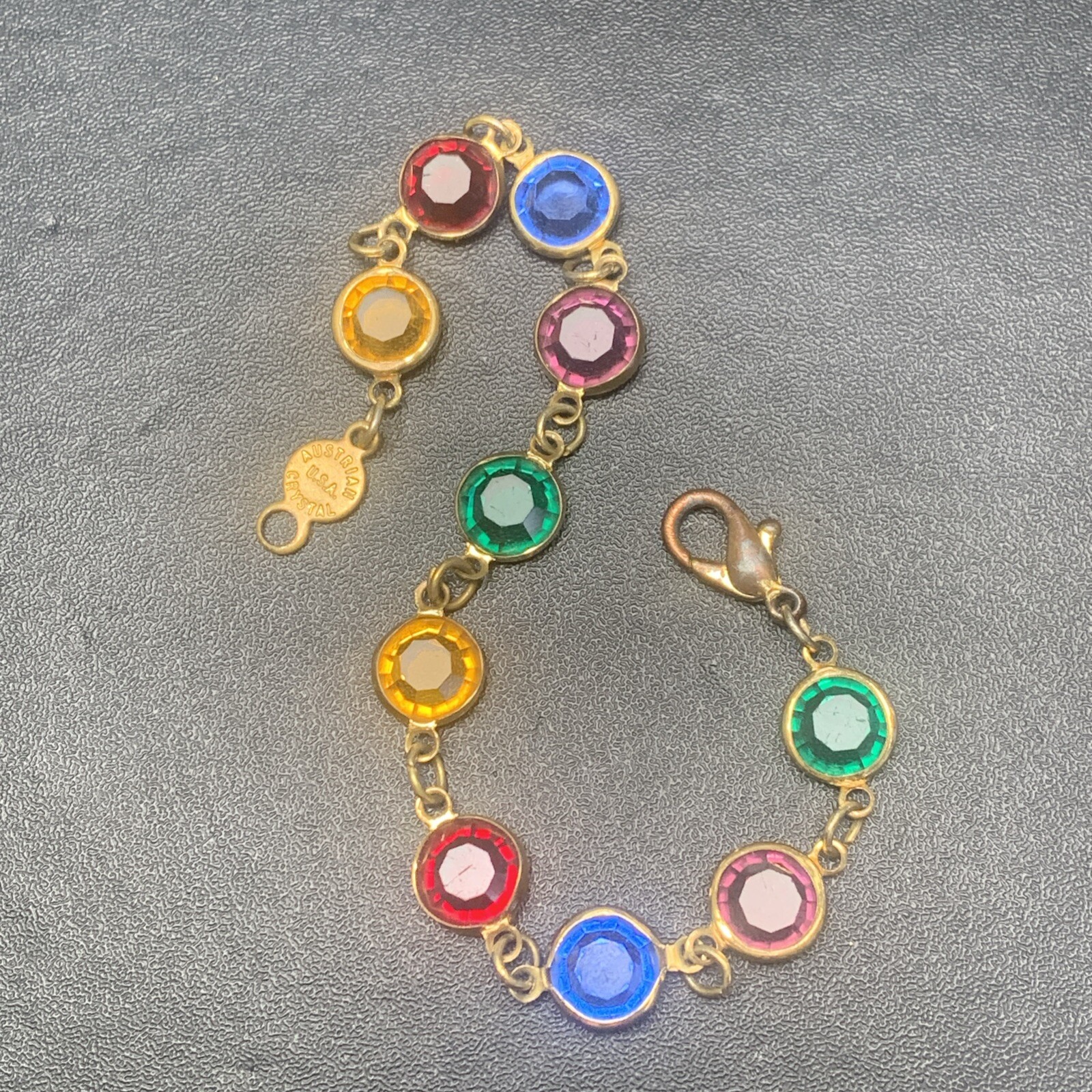 Austrian Crystal USA Signed Multi color Crystal Gold Tone Bracelet Vintage 7.5”