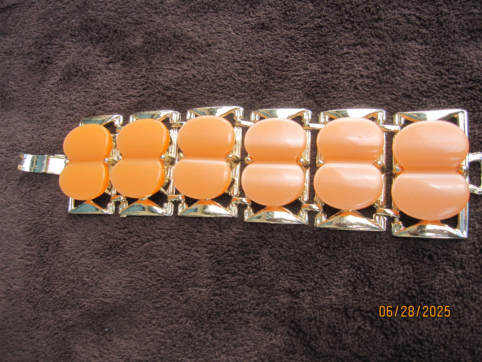 Vintage Bracelet unknown metal with orange faux stone Marked DAM
