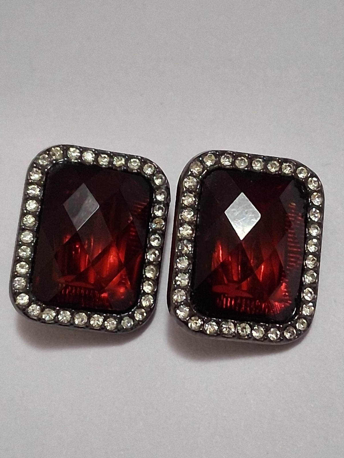 Red faceted acrylic rectangle clip on halo earrings, clear rhinestone border