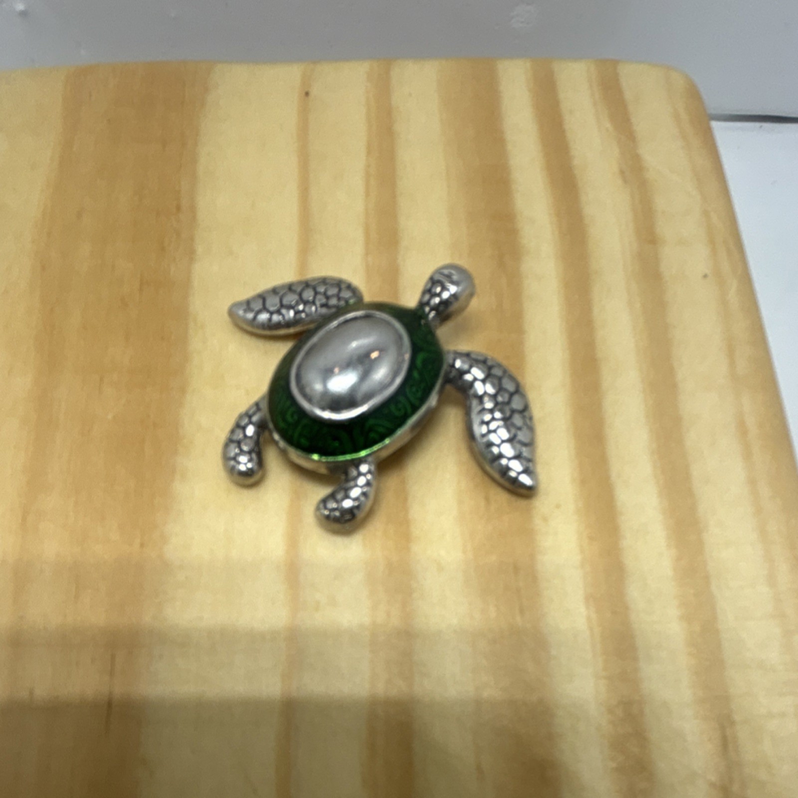 Metal turtle figurine with green and silver shell.(not jewelry)