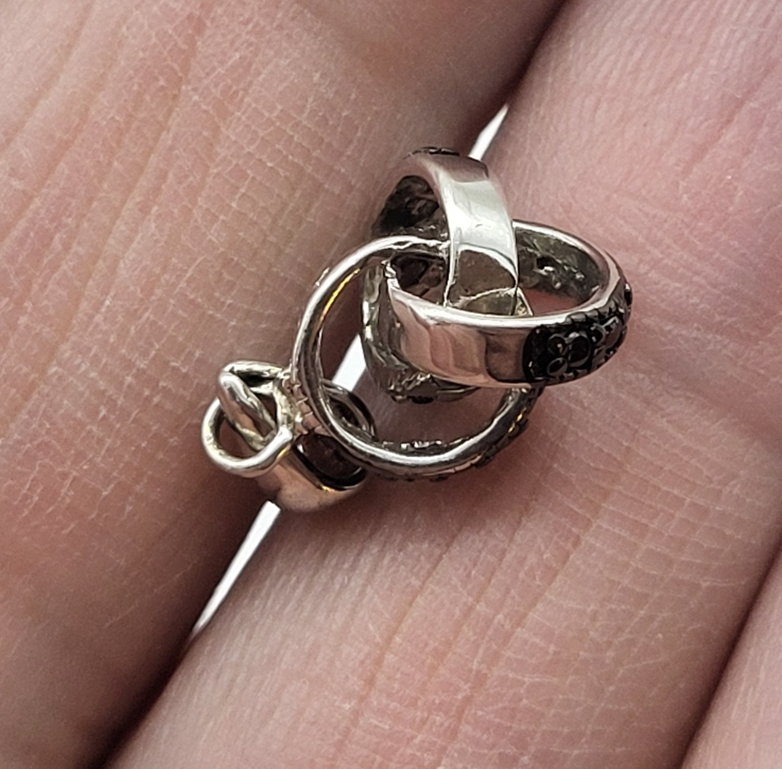 Estate, DBJ sterling pendant, 2 intertwined rings, black crystal stones