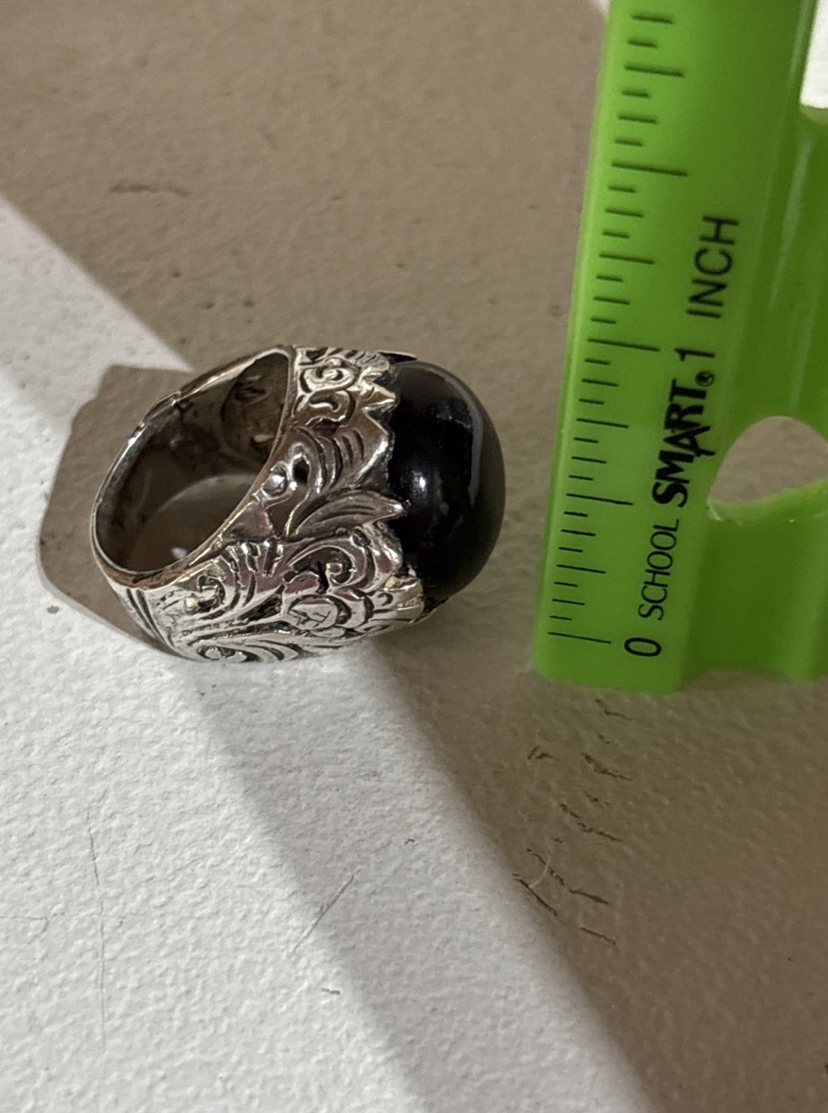 Vintage Silver‑Tone Ring with Black Onyx‑Style Cabochon Scrollwork Design