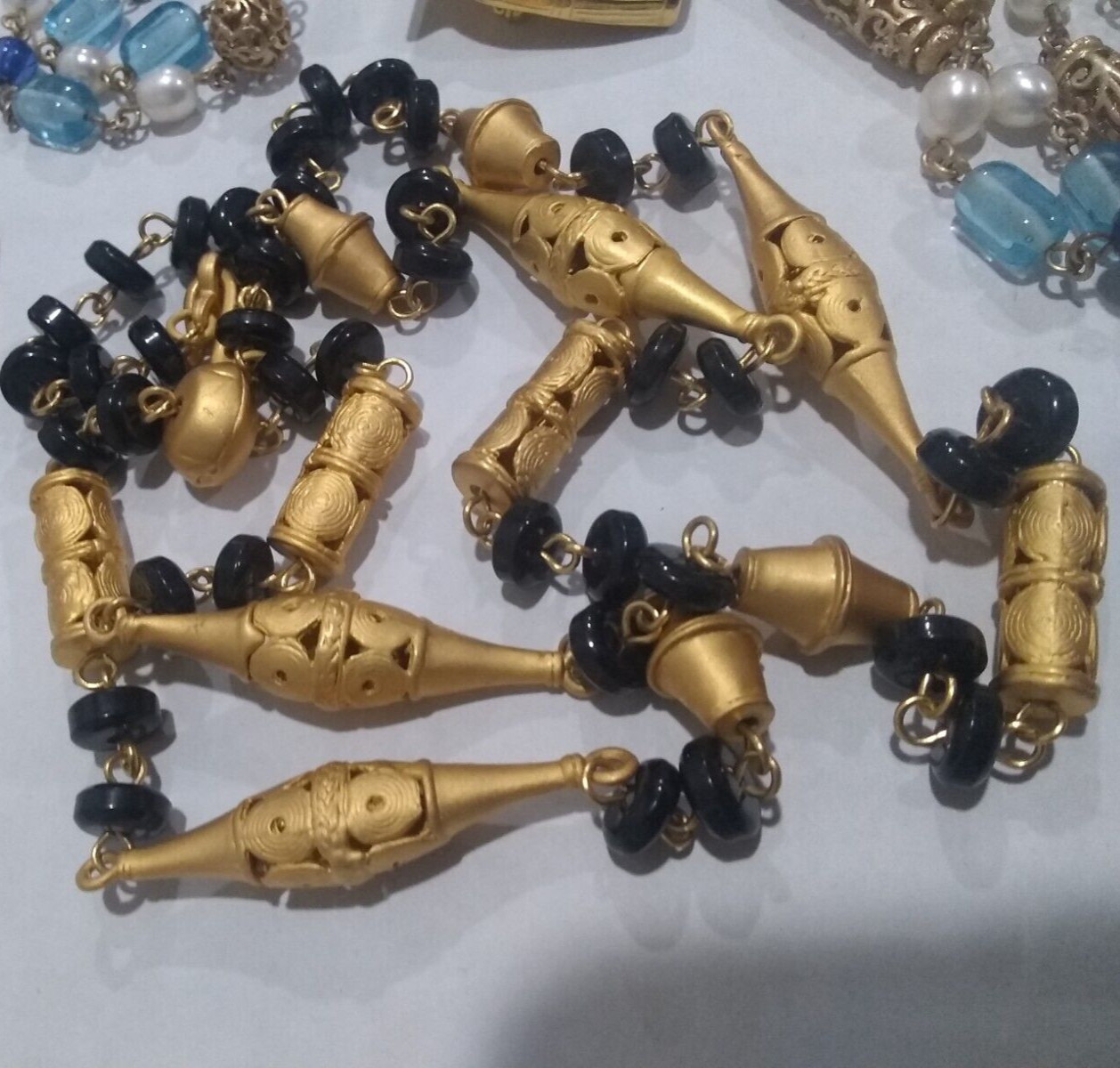 2 Necklaces. Black Egyptian Necklace & Blue Glass and cultured Pearls
