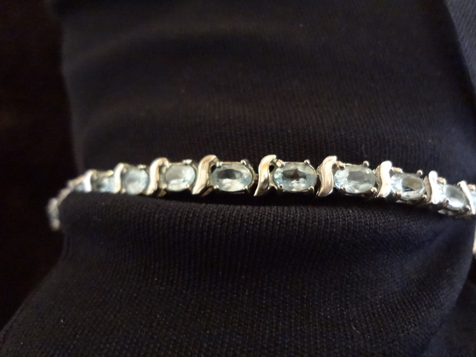 #48-DBJ-925 STERLING SILVER BRACELET LOADED WITH BEAUTIFUL STONES