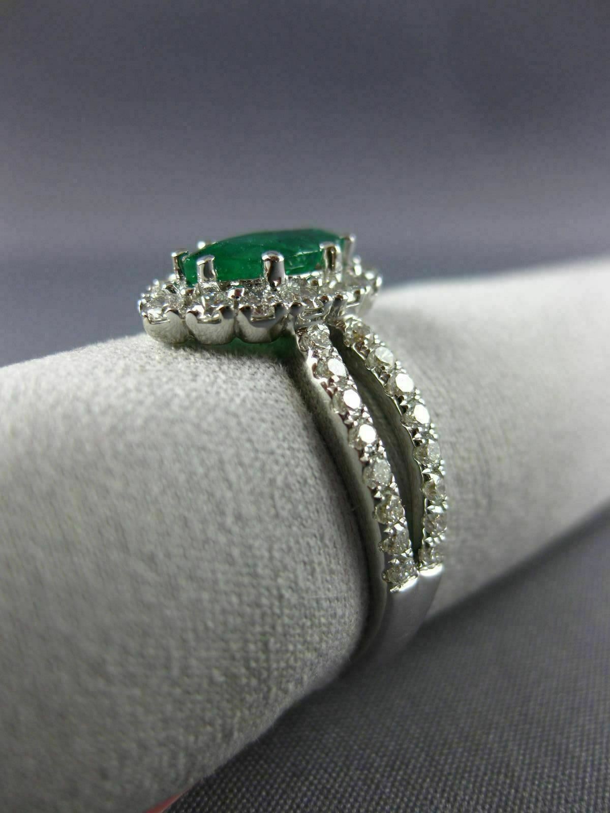 ESTATE 1.53CT DIAMOND & AAA EMERALD 18KT WHITE GOLD CLASSIC HALO ENGAGEMENT RING