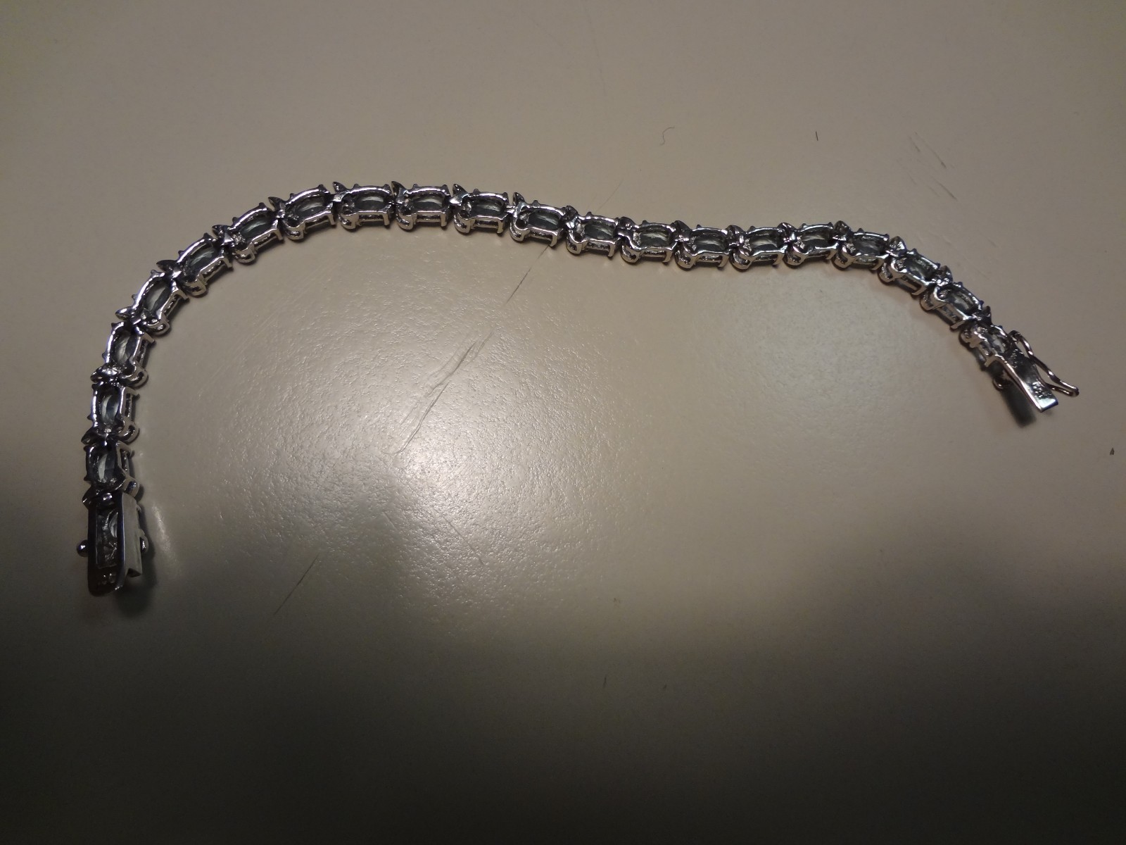 #48-DBJ-925 STERLING SILVER BRACELET LOADED WITH BEAUTIFUL STONES