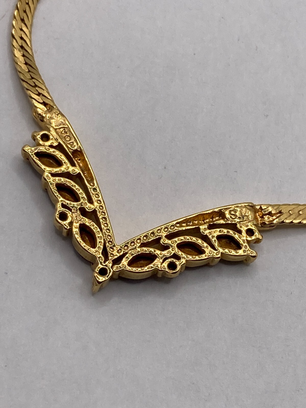 Vintage Avon V-Shaped Goldtone Necklace With Purple Stones
