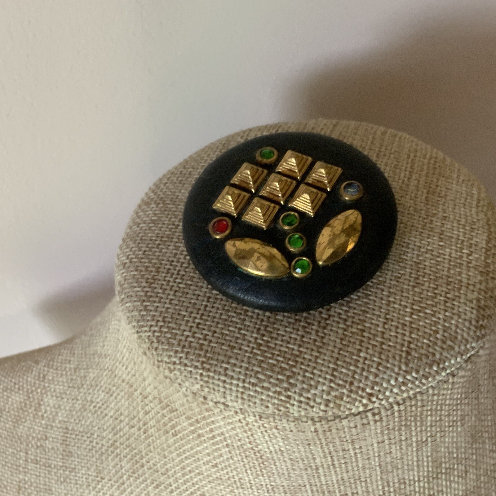 Vintage 1970s artisan made leather rhinestone modernist flower circle brooch