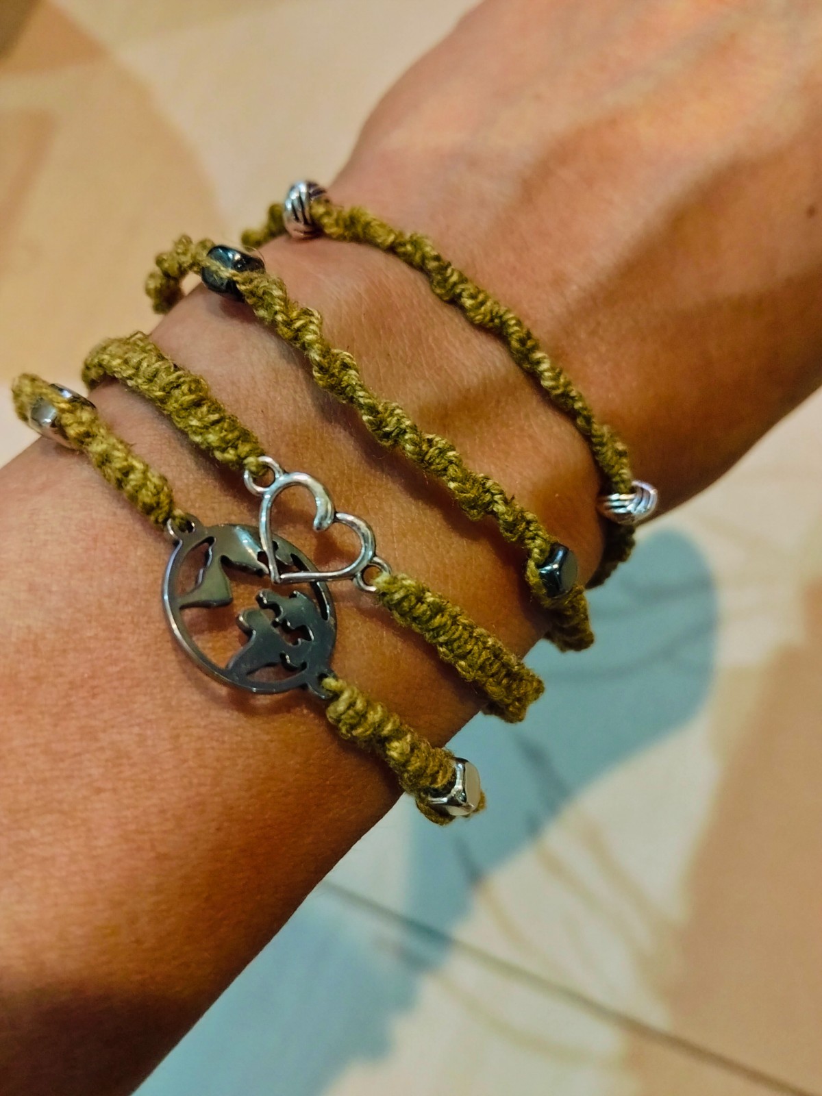A piece Adj Hemp Bracelet with Natural Marigold & Rust Dye – Boho Style 2 beads