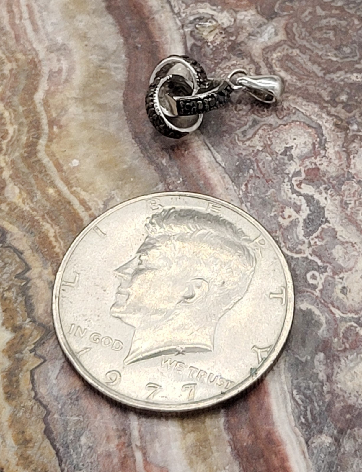 Estate, DBJ sterling pendant, 2 intertwined rings, black crystal stones