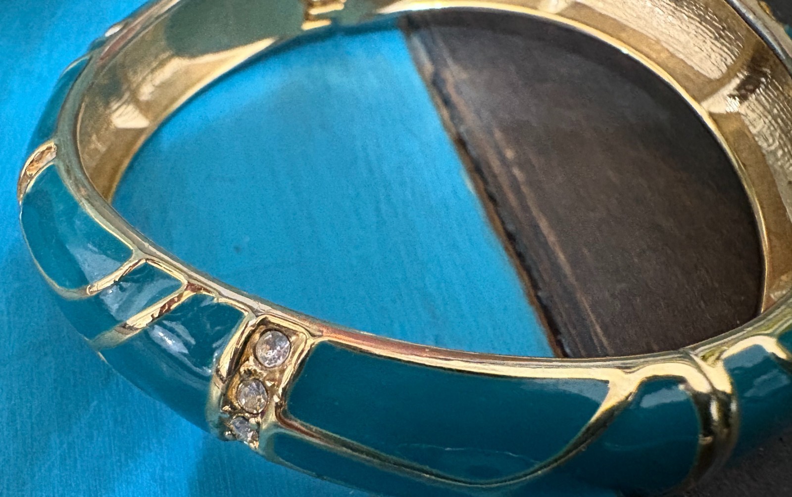 Vintage “Perfect Wave” azure blue enamel and crystal hinged bangle gold tone