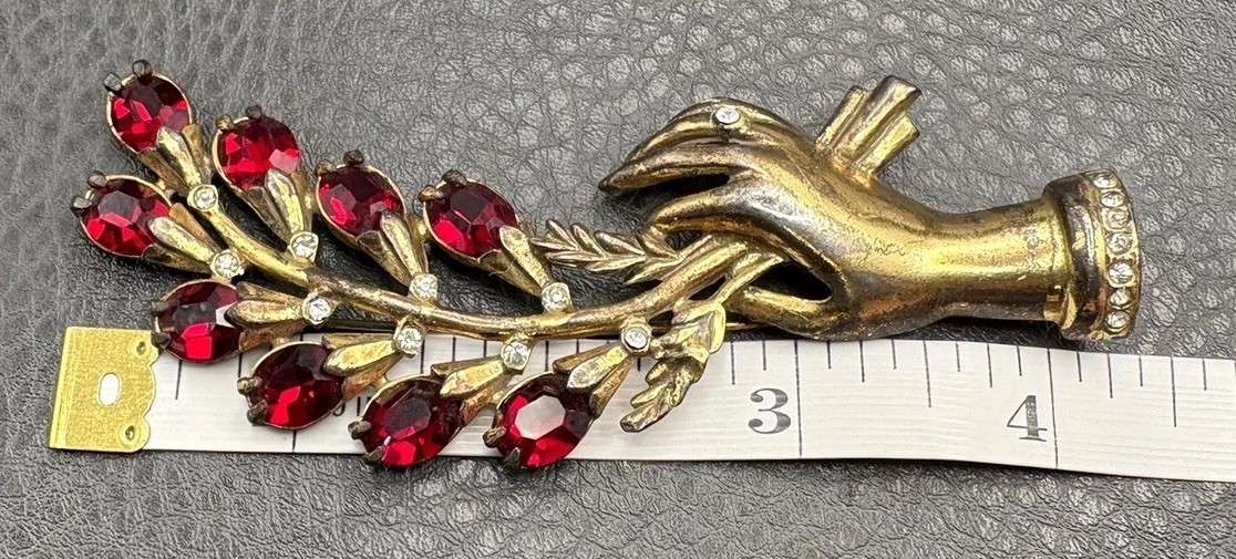 Vintage 4.25” HUGE Pot Metal Hand Holding Flowers Brooch Red Rhinestone