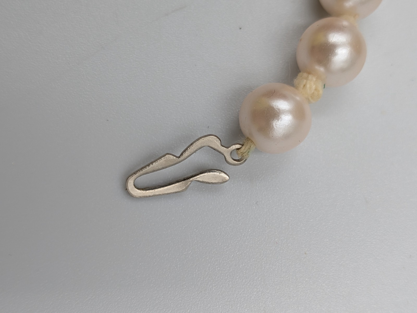 Vintage Faux Pearl Necklace Knotted with silver tone fish- hook clasp unbranded