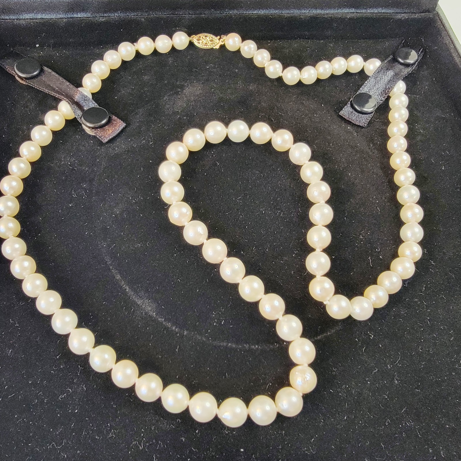 Vintage Pearl Necklace 6.9mm Pearls and 14K Gold Clasp 23.5 in Matinee Length
