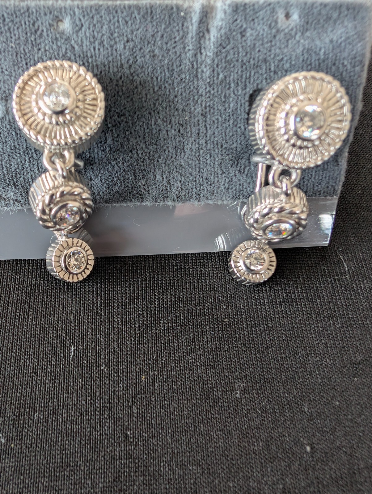 JUDITH RIPKA 925 Silver Twist Dangle Earrings