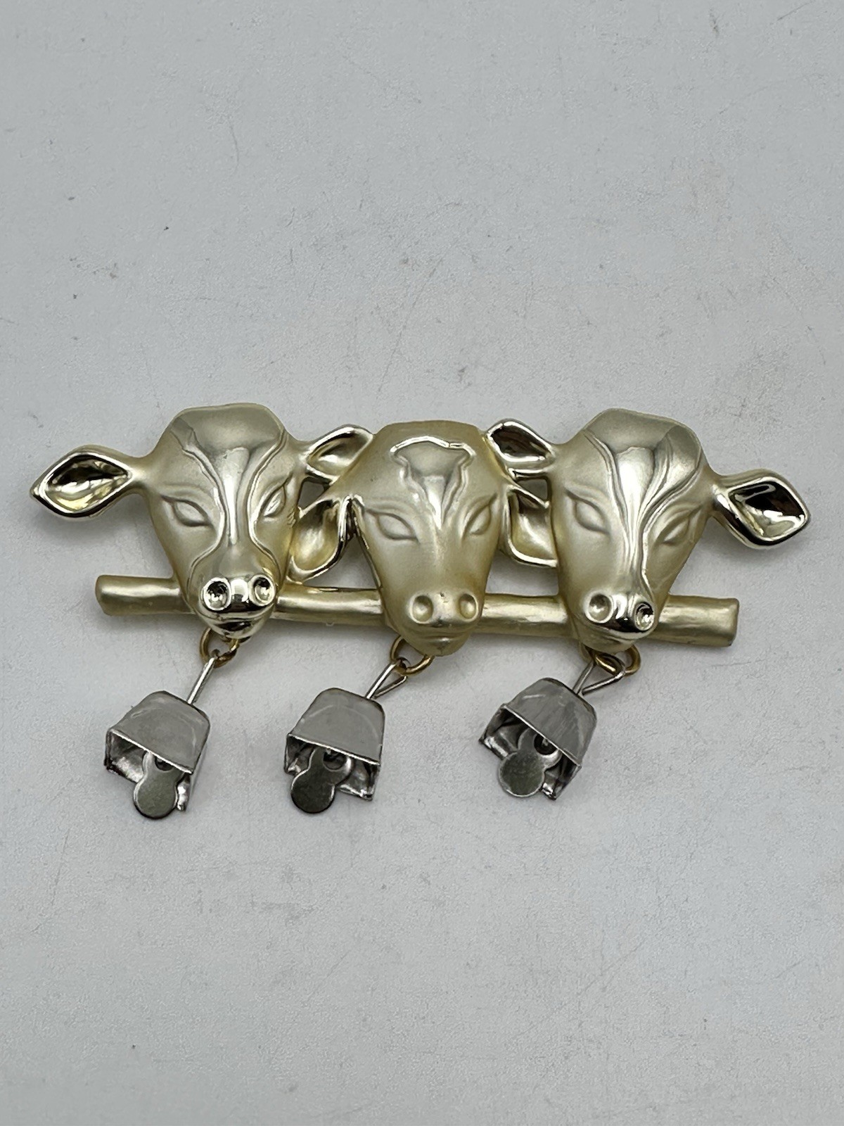 Vintage Gold Tone 3 Cow Brooch Pin with Dangling Silver Tone Bells Signed AJC