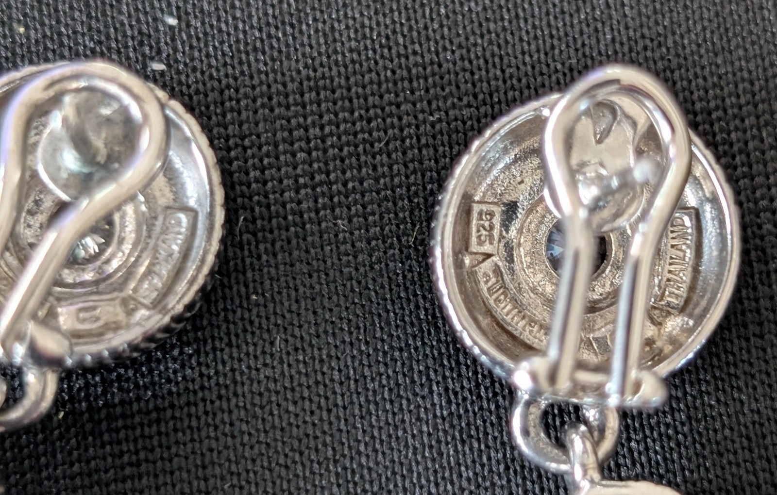 JUDITH RIPKA 925 Silver Twist Dangle Earrings