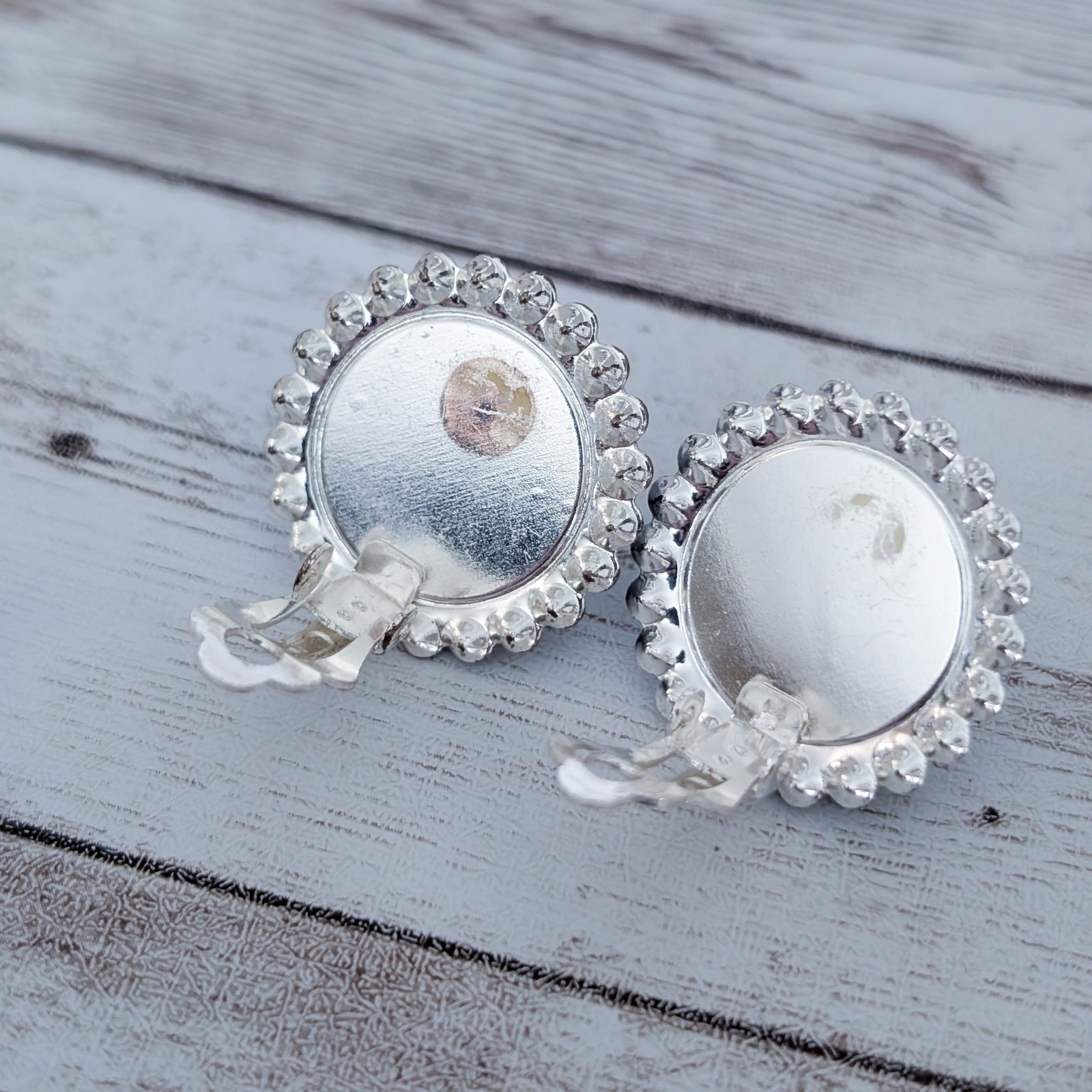 Vintage Clip On Earrings Large Metallic Center with Clear Gem Halo