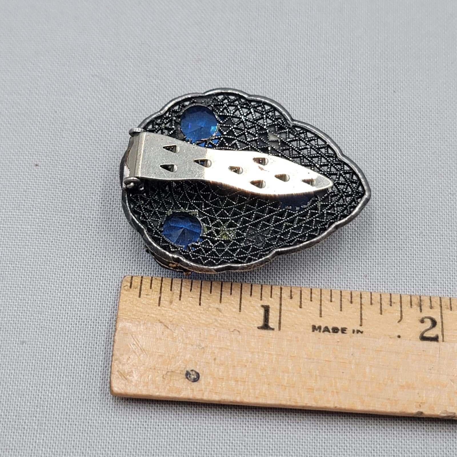 Vintage Bright Blue Rhinestone Dress Clip Embossed Oxidized Silver tone 1.5″