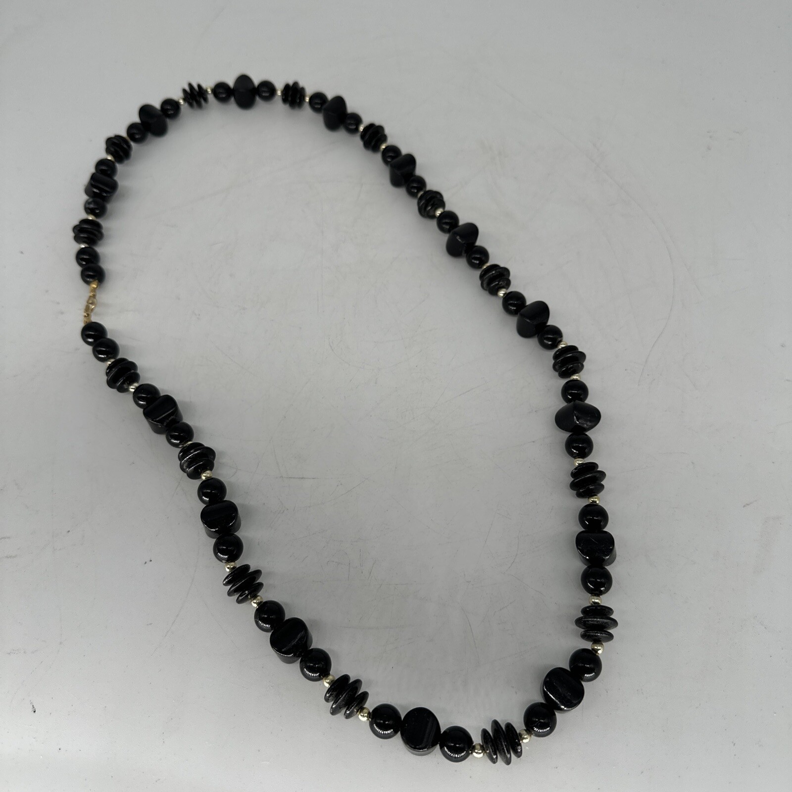 Vintage black irregular plastic bead with silver tone spacers 28″ necklace